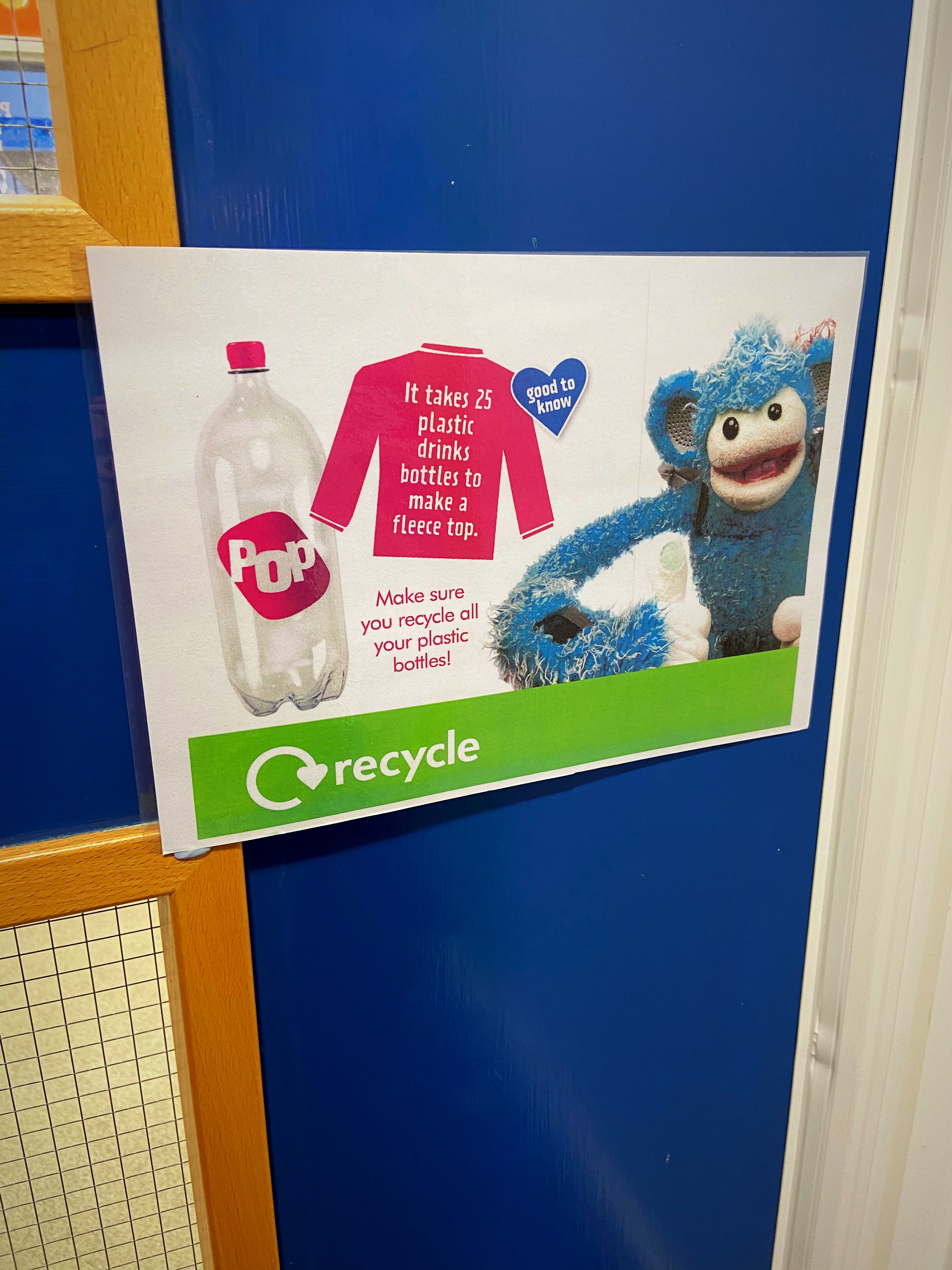 Recycling fact posters and strategies to save energy are displayed around the school